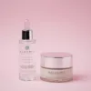 Vista frontale del set booster anti-age filler lift su sfondo rosa. Il set comprende siero e crema anti-age